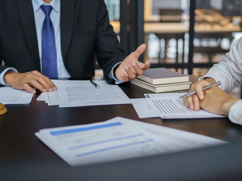 Business meeting discussing financial documents